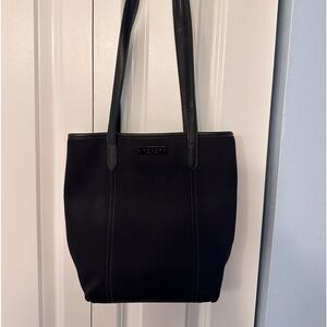 Black neoprene coach shoulder purse